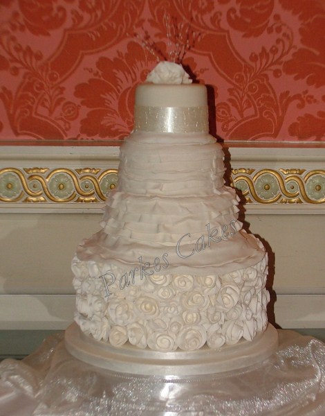 four tier ian stuart masquerade wedding dress cake