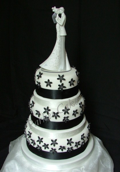 three tier black and white wedding cake