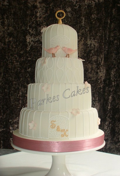 four tier dusky pink vintage birdcage wedding cake