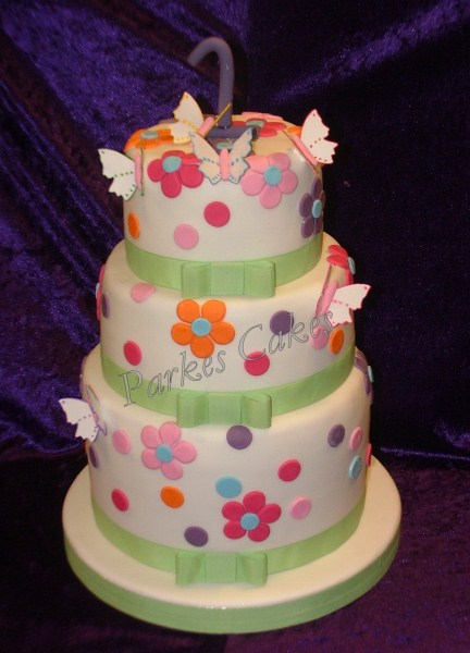 three tier blossoms and butterflies birthday cake