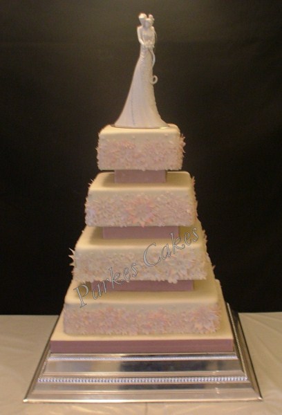 four tier square dusky pink wedding cake